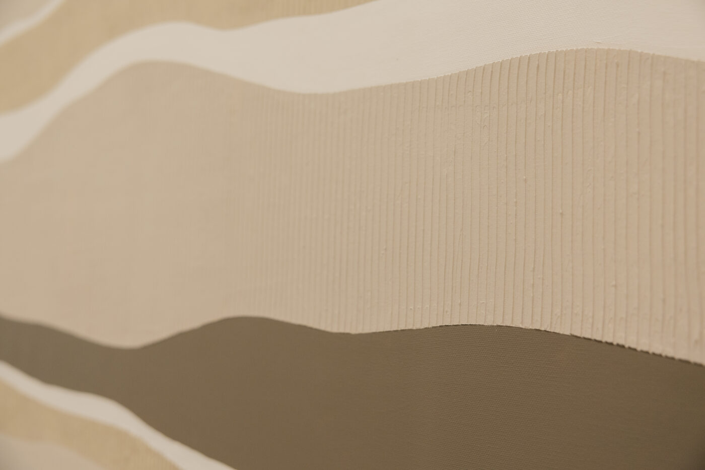 Original wave relief artwork created by Dr. Kevin Tan
