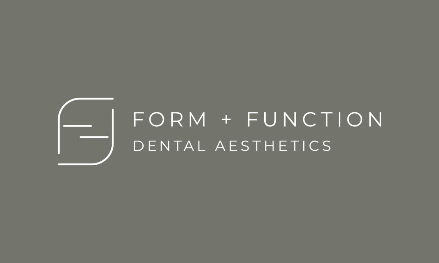 The Form + Function Dental Aesthetics wordmark on printed stationery